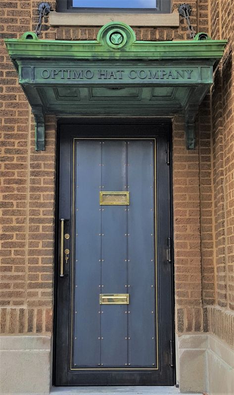 These non-forged gate doors were submitted by Bader Art Metal & Fabrication from Skokie, IL. The refined industrial steel door included "speakeasy" elements such as a sliding "peephole," designed to integrate into 1920's Fire House which was repurposed into a chic manufacturing facility. #NOMMAMetalWorks #metalfab Industrial Speakeasy, Speakeasy Door, Door Grill, Speak Easy, Fire House, Metal Fab, A Wrinkle In Time, Fire Doors, Steel Door