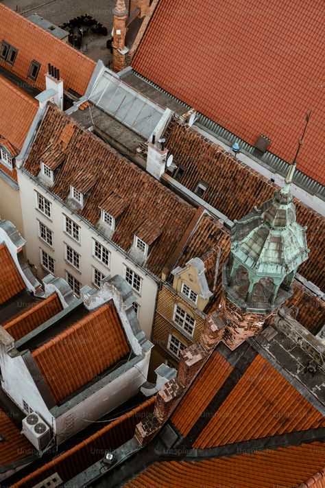 A bird's eye view of rooftops and buildings photo – Poland Image on Unsplash Bird Eye View Architecture, Old City Street, Birds Eye View Photography, Birds Eye View City, City Street Photography, Poland Cities, Architectural Sketching, City Streets Photography, Gdansk Poland