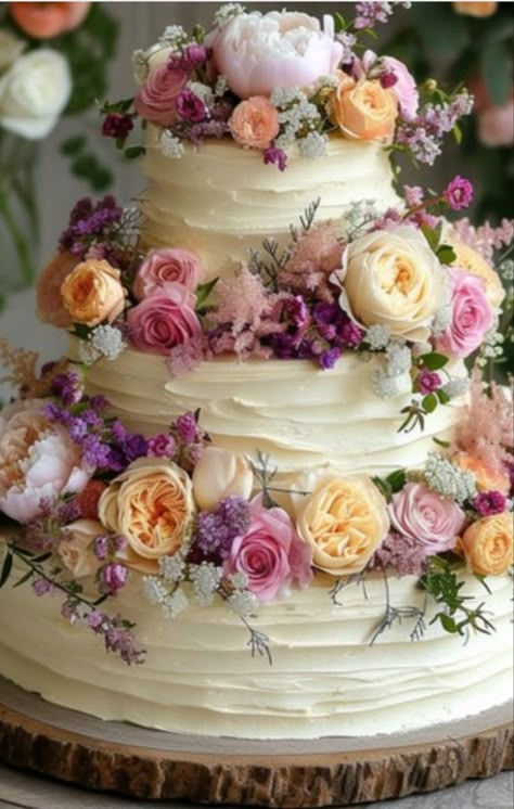 White wedding cake with flowers 🌷 Wedding Cakes Real Flowers, Pink Flower Wedding Cake, Wildflower Wedding Theme Cake, 2 Tier Wedding Cake With Flowers, Wedding Cakes 2024, Wedding Cake With Colorful Flowers, Nikah Cake, Flower Themed Cake, Fairy Wedding Cake