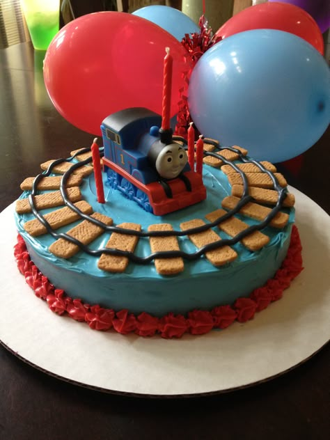 Thomas the Train birthday cake.  I usually shy away from a character birthday, but I actually love this cake.  AND I could do it myself. Train Birthday Cakes, Thomas The Train Birthday Cake, Thomas Birthday Party, Thomas Train Birthday, Thomas Train Cake, Thomas Birthday Parties, Thomas Cakes, 4de Verjaardag, Thomas Party