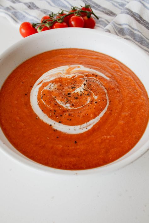 This healthy creamy tomato soup recipe is full of tasty tomatoey goodness. The addition of white beans instead of cornflour and the replacement of cream with yoghurt makes for a truly refreshing modification. These changes reduce the saturated fat content and adds extra fibre and protien into the soup. This suop is Gluten free and suitable for vegetarians and if usinga yoghurt alternative would be suitable for vegans too. #tomatosoup #bowlofgoodness #healthysoup #vegetarianrecipe #easysoup Red Pepper Tomato Soup, Roasted Tomato Basil Soup, Cream Of Tomato, Cream Of Tomato Soup, Roasted Garlic Cloves, Vegan Grilling, Roasted Tomato Soup, Basil Soup, Creamy Tomato Soup