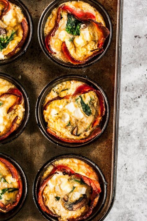 Delicious low carb bacon egg cups with a boost of veggies from mushrooms and spinach, plus crumbles of feta in every bite. You’ll love these healthy, make-ahead bacon egg cups that are packed with protein and take just 30 minutes to make. They're easy to customize and make paleo, too! #breakfast #lowcarb #glutenfree #savorybreakfast #brunch #bacon #eggs Brunch Bacon, Bacon Egg Cups, Healthy Make Ahead Breakfast, Mushrooms And Spinach, Egg Cups Breakfast, Spinach Egg, Bacon Eggs, Dinner Side Dishes, Egg Bites