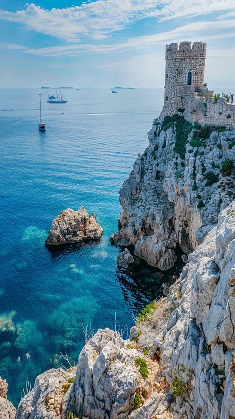 Coastal Castle View: A majestic #castle perched atop rugged #cliffs overlooking the serene blue #waters of the #Mediterranean #Sea. #castle #cliffs #sea #blue #water #aiart #aiphoto #stockcake ⬇️ Download and 📝 Prompt 👉 https://stockcake.com/i/coastal-castle-view_1094944_731810 Ocean Castle, Coastal Castle, Sea Castle, Majestic Castle, Timeless Architecture, Castle Ruins, Sky Landscape, Coastal Cities, Crashing Waves