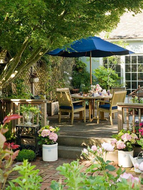 A bold blue umbrella provides style and shade for this relaxing patio. More simple outdoor living spaces: http://www.bhg.com/home-improvement/porch/outdoor-rooms/small-outdoor-living-spaces/?socsrc=bhgpin050713blueumbrella=2 Small Deck Designs, Relaxing Patio, Patio Inspiration, Have Inspiration, Small Outdoor Spaces, Backyard Retreat, Beautiful Backyards, Garden Care, Deck Design