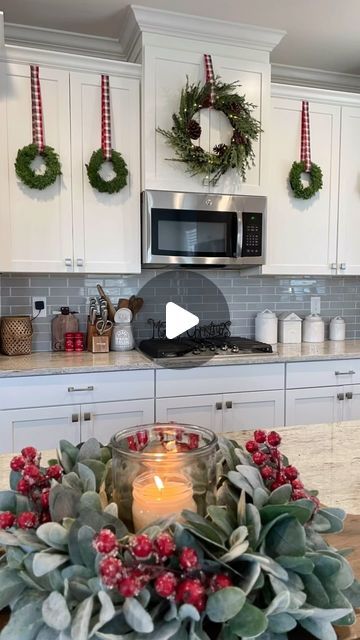 Liz Grella on Instagram: "One of the easiest ways to add cheer to your kitchen cabinets. I’ve also added just ribbon. But this is by far my favorite Christmas kitchen look.   I measure out the ribbon first-I recommend leaving it a little longer than you think you might need. I then use duct tape(yes, duct tape) on the inside of the cabinet. You can also use upside down command hooks. Duct has never damaged my cabinets. You can test it on a small area to make sure.   Comment WREATH for direct links sent directly to you. *Price for wreaths is for a set of 6!  #christmasdecor #christmasinspiration #christmasinspo #christmastime #christmasdecorating #christmaswreaths #christmaskitchen" Wreaths On Kitchen Cabinets, Michael Buble Christmas, Wreath Inside, Christmas Bows Diy, Kitchen Wreath, Christmas Decorations Apartment, Christmas Apartment, Christmas Tree Bows, Christmas Kitchen Decor