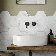 https://encrypted-tbn0.gstatic.com/images?q=tbn:ANd9GcQUywtiAOqzHb3vtO6nm8oGzz_pwu0sGcpTCQ&usqp=CAU Bathroom Hexagon Tile Wall, Hexagonal Tiles Bathroom, Bathroom Hexagon Tile, Hexagon Tile Wall, Bathroom Hexagon, Hexagon Bathroom, Hexagon Tile Bathroom, Hexagon Marble Tile, Carrara Tiles