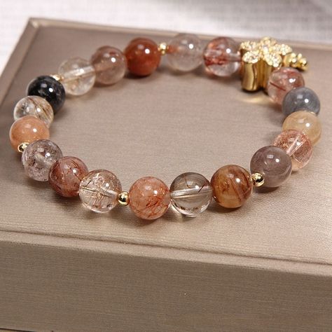 🌟💎 Unlock Your Path to Prosperity 💎🌟 Elevate your energy and style with our Prosperity Gold Rutilated Quartz Crystal Bracelet. Crafted from genuine Gold Rutilated Quartz, each bead is infused with powerful vibrations to attract wealth, success, and endless opportunities. Perfect for entrepreneurs and dream chasers ready to manifest abundance in their lives. Why just wear jewelry when you can wear prosperity? 🛒 Tap the link in our bio to start your journey towards abundance today! https://e... Daily Intentions, Five Petal Flower, Titanium Crystal, Purposeful Life, Rutilated Quartz Crystal, Five Elements, Purple Nail Designs, Meditation Bracelet, Titanium Bracelet