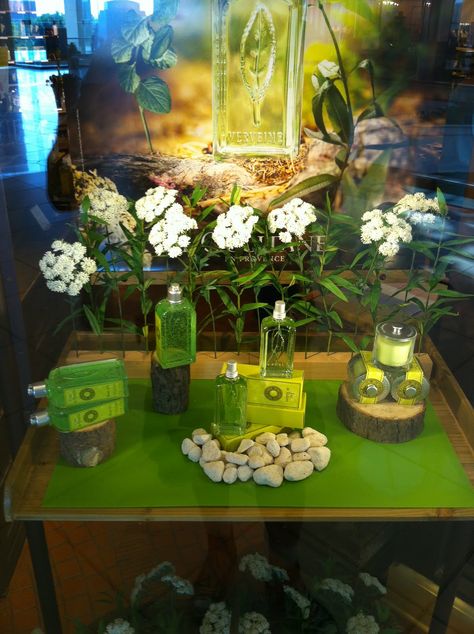 L'occitane ~ Excellent skincare products Stall Decorations, Wood Bird Feeder, Perfume Display, Visual Merchandising Displays, Window Display Design, Event Display, Pos Display, Cosmetic Display, Pop Display