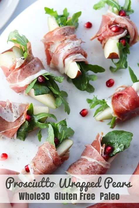 The perfect no-cook appetizer for your next holiday party or get-together, these healthy Whole30 Prosciutto Pears with Arugula Salad are deliciously sweet and savory - plus they're Paleo & Gluten Free! Prosciutto wrapped pears are assembled quickly in just a few minutes, making them a great recipe for last minute guests! #cookathomemom Prosciutto Wrapped Pears, Pear Arugula Appetizer, Prosciutto Wrapped Pears Appetizers, Pear Wrapped In Prosciutto, Pear And Prosciutto Flatbread, Pear Brie Prosciutto Appetizer, Prosciutto Pear Appetizer, Pear Prosciutto Blue Cheese Appetizer, Dried Pears