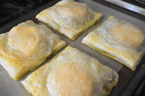 Pesto Chicken Turnovers – Jeanie and Lulu's Kitchen Chicken Turnovers, Spinach Puff Pastry, Tomatoes And Mozzarella, Spinach Pesto, Puff Pastry Crust, Cheese Puff Pastry, Walnut Pesto, Chicken Spinach, Frozen Puff Pastry