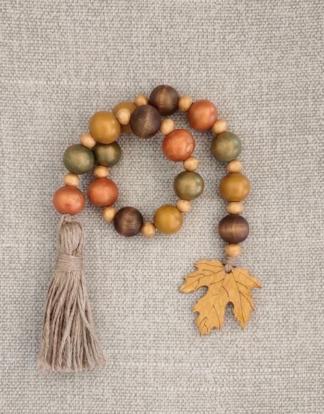 Fall Wood Bead Wreath, Fall Beads Decor, Wooden Bead Decor, Wooden Bead Garland Decor Ideas, Wooden Beads Crafts, Wrapping Candles, Fall Bead Garland, Fall Wood Bead Garland, Antique Gold Paint