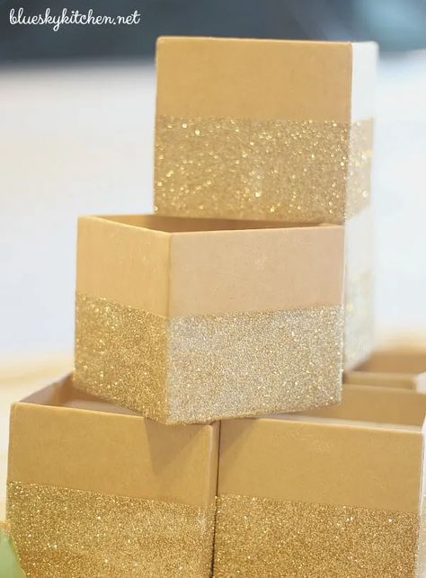 How to Make the Cutest, Glittery Gift Boxes for favors, hostess gifts or to decorate your home for the holidays. Easy DIY with glitter and washi tape. Decorating Gift Boxes, How To Decorate A Box Gift, Decorate Boxes Ideas, Decorate Gift Boxes, Wood Box Design, Washi Tape Diy, Glitter Gifts, Kraft Gift Boxes, Diy Holiday Decor