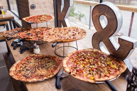 Pizza Served At Wedding, Pizza Party Display Ideas, Pizza Display For Wedding, Pizza Buffet Wedding Receptions, Pizza Table Display, Pizza And Wings Before The Rings, Pizza Display For Party, Pizza Bar Wedding, Pizza Reception