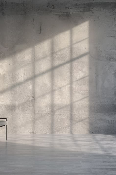 Minimalist living room with shadow play and neutral tones Minimalist Interior Aesthetic, Grey Minimalist Interior Design, Interior Aesthetic Minimal, Minimalist Background Aesthetic, Grey Photoshoot Background, Beige And Grey Aesthetic, Silent Luxury Aesthetic, Tranquil Color Palette, Refined Aesthetic