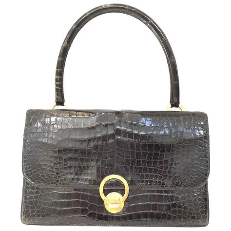 Vintage  Hermes crocodile purse | From a collection of rare vintage evening bags and minaudières at https://www.1stdibs.com/fashion/handbags-purses-bags/evening-bags-minaudieres/ Vintage Hermes Bag, Hermes Crocodile, Crocodile Purse, Alligator Handbags, Hermes Vintage, Crocodile Handbags, Vintage Leather Handbag, Vintage Evening Bags, Vintage Tote Bag