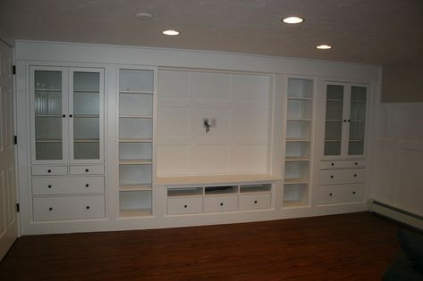 This is amazing! Built-in made from Ikea furniture! Looks fabulous!! I want this in my basement! Ikea Hemnes Cabinet, Eames Design, Ikea Bookshelves, Basement Family Room, House Family, Ikea Hemnes, Ikea Cabinets, House Interiors, Built In Cabinets