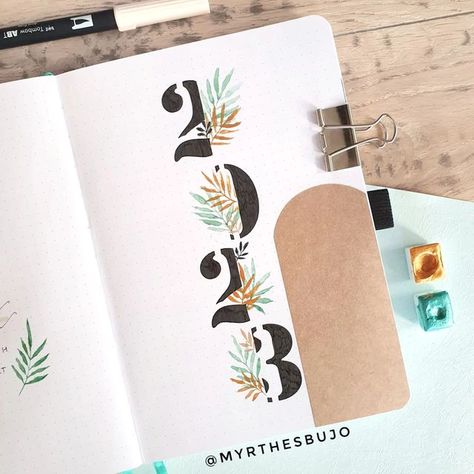 Myrthe | Bullet journal 💕 on Instagram: "2023 set up. Is your bullet journal ready for 2023? • Theme inspired by @bloomanddot and @inprint.xyz • • • • • #bujo #bulletjournalcommunity #bulletjournalcover #bujogirl #bujoaddict #bulletjournal #bujoaddict #bujocommunity #bujoinspiration #plannerinspo #plannercommunity #bujosetup #bujo2023 #planwithme #planneraddict" Word For 2023, Bullet Journal Front Page, 2023 Bujo, Welcome 2023, Bullet Journal Month, Bullet Journal Set Up, Bullet Journal Ideas Templates, Bullet Journal Cover Page, Creating A Bullet Journal