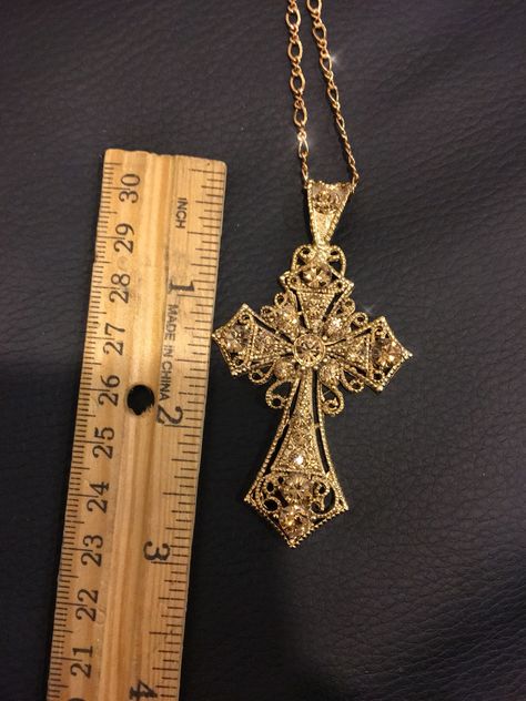 24k antique gold plated cross with champagne colored crystals. Picture does not do justice. I always get compliments when I'm wearing this out. Excessive Jewelry Aesthetic, Xoxo Jewelry, Golden Arrow, Golden Cross, Dope Jewelry Accessories, Jewelry Accessories Ideas, Dope Jewelry, Jewelry Fashion Trends, Stacked Jewelry