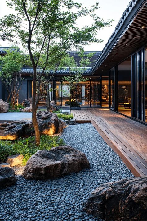 Chinese inner courtyard with garden walls wooden deck rocks chinese detailing modern office building visible over the roof from the courtyard. These Chinese courtyard houses revive ancient charm and bring tranquility into modern living. House Inner Courtyard, Courtyard House With Pool, Chinese Courtyard Garden, Courtyard In Middle Of House, Modern House Courtyard, Inner Courtyard House, Modern Courtyard Design, Japanese Courtyard House, Home With Courtyard