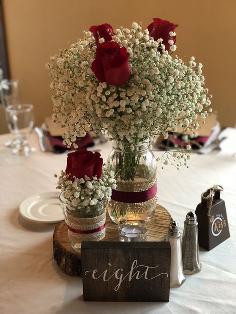 Baby’s breath with different size mason jars on the wood plaque. Red Rose Centerpiece, Wedding Table Centerpieces Rustic, Red Roses Centerpieces, Burgundy Wedding Centerpieces, Creative Wedding Centerpieces, Rose Centerpiece, Wedding Centerpieces Mason Jars, Rose Centerpieces, Rustic Wedding Table