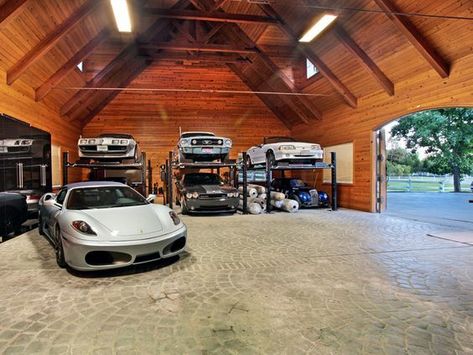 How about a customized barn to house that prized classic car collection.  Barn Pros can set you up with a wide variety of packages including everything from blueprints (you could pay up to $30,000 for those alone) to lumber and hardware, ready to build—the only materials not included are nails, concrete, and the final layer of roofing. Prefab Garages, Garage Solutions, Plan Garage, Man Garage, Auto Garage, Cool Garages, Ultimate Garage, Car Barn, Dream Car Garage