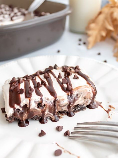 Chocolate lovers unite! Perfect for a potluck or the holidays, this rich and decadent icebox cake is the best no-bake chocolate dessert. The Best Chocolate Icebox CakeIf you’re looking for an easy, and decadent no-bake dessert, then this recipe is one you’ll want to save and make over and over again. Made with Land O Lakes® Cocoa Classics® Cocoa Mix this chocolate icebox cake is simply the best!Land O Lakes® Cocoa Classics® Cocoa Mix is a premium gluten-free cocoa. With more than 18… Chocolate Icebox Cake, No Bake Chocolate Desserts, Recipes For Cookies, Cheesecake Cups, Chocolate Whipped Cream, Chocolate Sandwich, Chocolate Sandwich Cookies, Favorite Dessert Recipes, Hot Cocoa Mixes