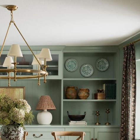 Farrington Lane on Instagram: "Things are winding down here for our Christmas and New Year closure. Before we go, here is a traditional dining room we wrapped up this year for one of our Northwest Hills projects. We added the custom built-in cabinetry, swathed the room in a calming blue-green, and used @lisafinetextiles to frame the existing windows in custom draperies (or curtains 😉 @amityworrelco). Our client had some of the perfect vintage and antique tabletop to showcase here, and we added in a few new pieces as well. We particularly love the barely there blue plates on the top shelf!  Photo by @jeff_jones_photo" Green Waynes Coating, Coastal Grandmother Dining Room, Blue Green Dining Room, Built Ins Dining Room, Waynes Coating, Dining Room Built Ins, Dining Room Built In, Jeff Jones, Green Dining Room