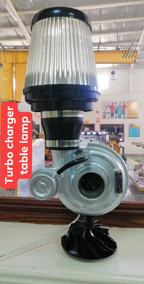 Damaged turbocharger with air filter Car Parts Decor, Car Part Furniture, Automotive Furniture, Lamp Diy, Car Furniture, Automotive Decor, Garage Storage Organization, Industrial Lamp, Metal Projects