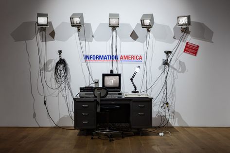 Julia Scher: Information America, 1995 Transformers Video, Vinyl Signage, Metal Office Desk, Wires And Cables, Lamp Office, American Tank, American Fine Art, Desk Lamp Office, Sound Installation