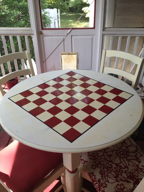 Turn a simple table into a game table.  I painted a checker/chess board on the top, and put two coats of polyurethane for the finish. Painted Chess Table, Rustic Game Tables, Checkers Table, Checkerboard Table, Obx Nc, Wood Chess Board, Chess Table, Game Tables, Checker Board