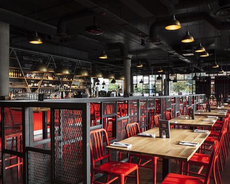 The Union, Chiswick provides a place for leisure in the business park. With a range of food and drinks on offer, The Union has something for everyone. Inside Out worked with interior designers to provide rustic Character oak table tops and custom painted Bar Code chairs, coming together to create an industrial style space in deep greys and pillar box reds. Restaurant Industrial Design, Industrial Restaurant Design, Oak Restaurant, Painted Bar, White Restaurant, Oak Table Top, Industrial Restaurant, Paint Bar, Bar B Que