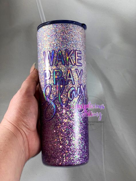 "This is a stunning glitter tumbler, handmade by yours truly with high-quality polyester glitter and sealed to perfection with FDA compliant resin for a gorgeous, glass like finish. Due to handmade designs each tumbler are sisters, not twins! Your tumbler includes a decal of your choosing whether it be a name, monogram, or quote! Or leave blank and let that sparkle shine! ♥ Don't see something you like? We can work together to create a completely Custom Glitter Tumbler just for you! ♥ ORDERING: Lilac Tumbler, Purple Glitter Sunflower Tumbler, Ombré Glitter, Name Tumbler Cups Purple, Pink And Purple Glitter Tumbler, Wake Pray Slay, Lavendar Glitter Tumbler, Purple Opal, Custom Glitter