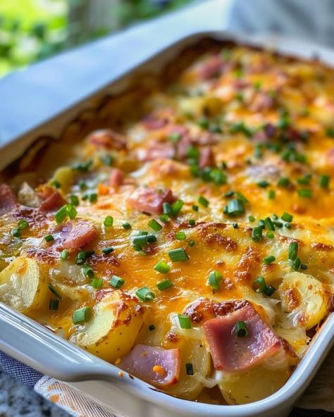 Call it 'Easter Hobo Casserole', but your man's gonna want another helping, no joke. Scalloped Potatoes Ham, Hobo Casserole, Casserole Kitchen, Scalloped Potatoes And Ham, Ham Potato, Fussy Eaters, Gooey Cheese, Scalloped Potatoes, Sliced Potatoes