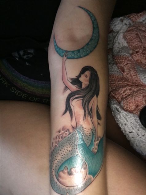 Mermaid goddess reaching for the moon Mermaid Mother Tattoo, Siren And Moon Tattoo, Mermaid And Moon Tattoo Designs, Mermaid With Moon Tattoo, Thigh Mermaid Tattoo Women, Reaching For The Moon, Mermaid Goddess, Fish Tattoos, Jesus Fish Tattoo