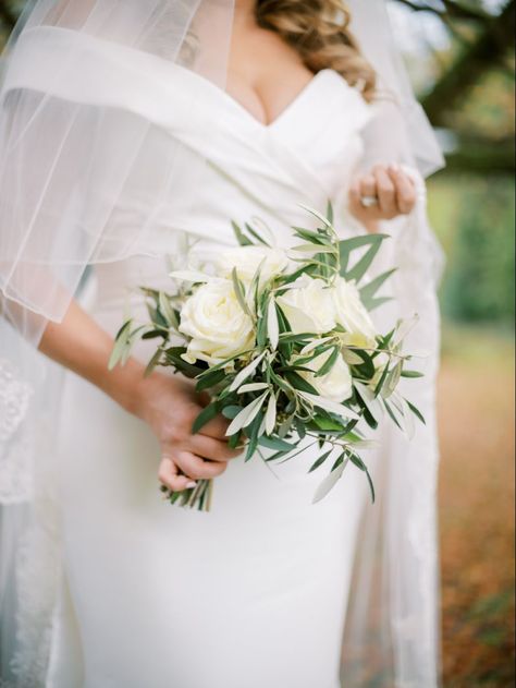 Simple Bridal Bouquetwhite rose with olive leaves and eucalyptus Irish Bouquet Wedding, Wedding Decoration With Olive Leaves, Italian Ruscus Bridesmaid Bouquet, White Rose And Eucalyptus Bouquet Simple, Olive Branch Bridal Bouquet, Olive Leaf Bouquet Wedding, Wedding Flowers With Olive Leaves, Bridal Bouquet Olive Leaves, Olive And White Roses Wedding