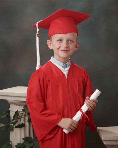 Preschool Cap And Gown, Kindergarten Graduation Pictures, Graduation Gown And Cap, Lollapalooza Outfit, Kids Graduation, School Portraits, Graduation Gown, Overalls Outfit, Fancy Gowns