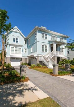 Charming coastal style home set on idyllic Daniel Island, South Carolina | One Kindesign Beach Houses Exterior, Paint Trim Ideas, House For Barbie, Beach House Exterior Colors, Modern Beach House Decor, Beach House Designs, Beach Chic Decor, South Carolina Homes, Florida Gulf Coast