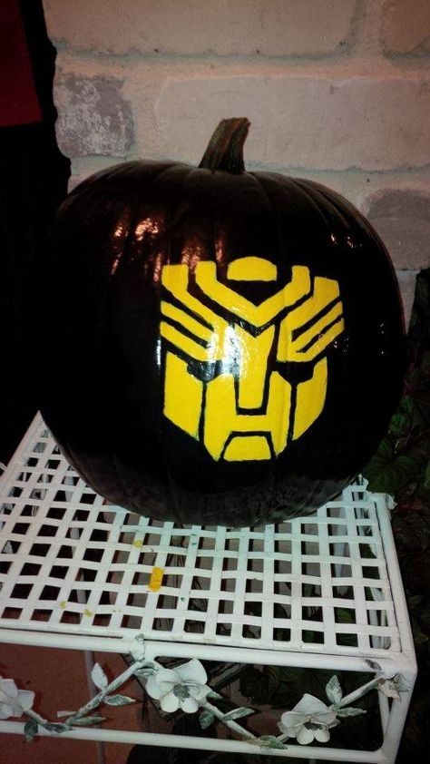 DIY  Bumble Bee painted pumpkin; this Transformer was my grandson's costume this year, the transformer Pumpkin outline is a bit off but now i know to put painters tape to line up the image. Transformer Pumpkin, Transformers Pumpkin, Transformers Painting, Diy Bumble Bee, Halloween Pumpkin Painting Ideas, Halloween Pumpkin Painting, Painted Pumpkin Ideas, Pumpkin Outline, Traditional Halloween