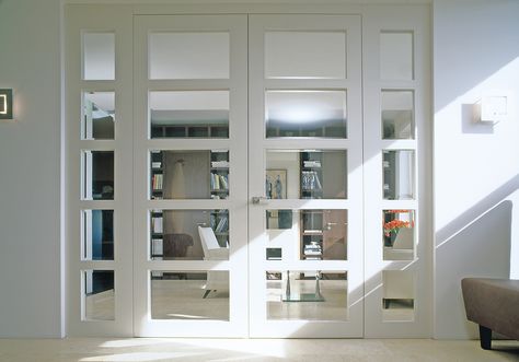 The rooms with high ceilings deserve tall internal doors that make the most grandiose feature of a building. For this reason, having a sophisticated design on your tall and wide door is not essential in terms of how noticeable the door is, as the internal door height is impressive enough. French Doors With Sidelights, Wooden Bifold Doors, Rooms With High Ceilings, Installing French Doors, Internal Double Doors, Glass Room Divider, Internal French Doors, Internal Glass Doors, Double Doors Interior