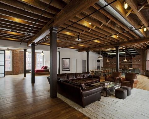 Basement w/unfinished ceiling, wood floor   I like the stained unfinished ceiling - Good idea for Rustic. Exposed Basement Ceiling, Industrial Basement, Traditional Family Room, Tribeca Loft, Basement Inspiration, Diy Basement, Basement Plans, Bar Designs, Basement House