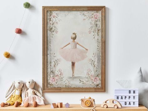 View different hair color variations HERE: https://www.etsy.com/shop/WildfieldPrintsCo?search_query=Gir-1-14 🩰 A Dreamy Tribute to Grace & Ballet Delight your little dancer with this elegant vintage-style ballerina print--a breathtaking piece that captures the innocence, beauty, and passion of ballet. This artwork features a blonde-haired little ballerina in a soft pink tutu, framed by delicate floral details against a warm beige distressed background. Perfect for nurseries, girls' rooms, or da