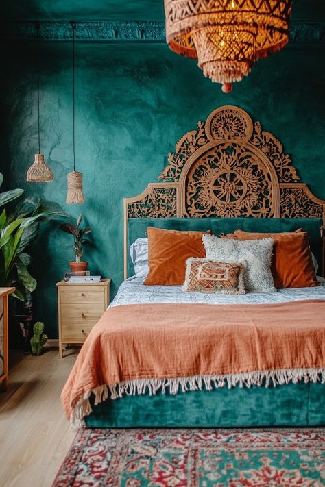 teal-and-orange-bedroom Emerald Green Burnt Orange Bedroom, Teal Bed Frame Bedroom Ideas, Muted Teal Bedroom, Orange Feature Wall Bedroom, Ethnic Bedroom Design, Navy Teal Bedroom, Desert Themed Bedroom, Sage Green And Orange Bedroom, Coral And Blue Bedroom