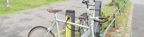 Entwurfreich / SMARTPOLE / ebike / charging / station / urban / spaces / design / consumer electronics / yellow / anthracite E Bike Charging Station, Urban Spaces Design, Courtyard Design, Head Board, Cycle Shop, Urban Spaces, E Bike, Cafe Design, Charging Station