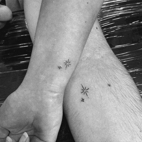 A close-up of two arms featuring small, dainty matching star tattoos with minimalist line designs, highlighting the elegance and simplicity of matching star tattoos. Matching Star Tattoos, Star Tattoo Ideas, Special Tattoo, Dainty Designs, Special Tattoos, Star Tattoo, Matching Tattoo, Star Tattoos, Best Friend