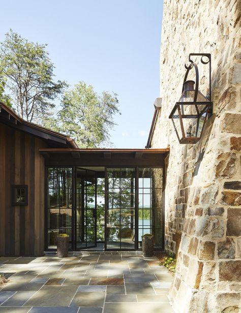 Jeffrey Dungan Architect | William Abranowicz Photography. | stone house | exterior | curb appeal | lantern | hanging lantern | DESIGNS Jeffrey Dungan, Lake Keowee, Stone Cottage, River House, Mountain Retreat, Classical Architecture, Mountain House, White Paint, The Ranch