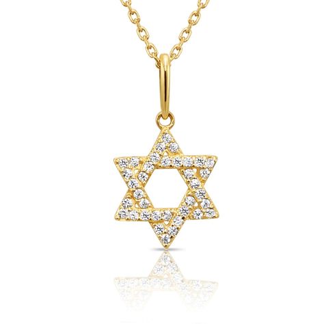 This very elegant yet simple star of David design can be worn everyday or on special occasion. Our beautiful 14k necklace shines beautifully with a high quality Cubic Zirconia stones. Perfect with any outfit and a must have for any jewelry collection. ◆ Crafted in 14K Solid Gold ◆ Chain length: 18 inches ◆ Pendant Height: 17mm ◆ Pendant Width: 10mm ◆ Sparkling high quality solitaire cubic zirconia stones ◆ Great gift that she'll love to wear ◆ Same day shipping (except weekends) and Comes in a FREE elegant Gift Box! Star Of David Pendant, Solid Gold Chains, Star Of David, Gold Star, Gold Stars, Chain Pendants, Elegant Gift, Cable Chain, Chain Lengths