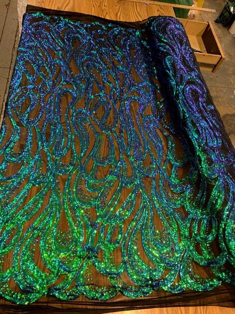 MERMAID Tear Drop Design Sequined Pattern on Mesh Lace Fabric by the Yard, Half Yard and Wholesale - SKU 1068 Sparkling sequins in a big tear drop pattern adorn this elegant fabric embroidered on mesh. Perfect for evening destinations, costumes, etc. *57 inches wide *Stretch: 4-way *Edge: Straight Mens Outdoor Fashion, Iridescent Fabric, Mermaid Tears, Drops Patterns, Formal Wear Dresses, Iridescent Green, Blue Mermaid, Stretch Velvet, Evening Gowns Formal