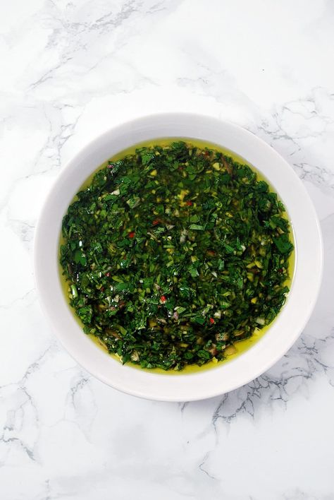 This traditional Argentinian sauce is made with fresh parsely and cilantro. It is the perfect low carb, dairy free and gluten free sauce or dressing. Use it for grilled meats or fish, as a dressing for salads, or just anywhere you want to add a punch of flavor. Chimichurri Salad, Easy Chimichurri Sauce, Chimichurri Sauce Recipe, Gluten Free Sauces, Chimichurri Recipe, Flexitarian Diet, Grilled Meats, Herb Sauce, Chimichurri Sauce