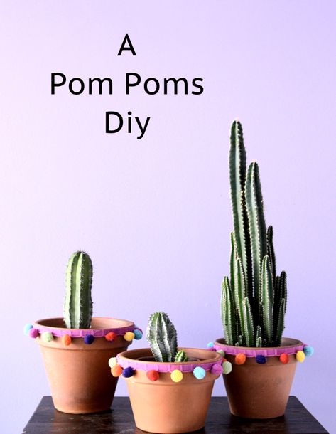 A Pom Poms Diy with Terra-cotta Pots Pom Poms Diy, Pots Design, Diy Pom Poms, Plant Pot Diy, Painted Pots Diy, Flower Pot Design, Painted Terra Cotta Pots, Diy Flower Pots, Painted Flower Pots