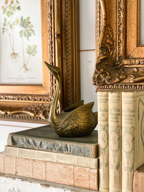 Looking for ways to refresh your mantel with a vintage look? Check out my tips to decorate a mantel using some of my favorite vintage finds! #robynsfrenchnest #springdecor #antiques #frenchfarmhousedecor Vintage Brass Decor, Faux Branches, Brass Swan, Vintage Vignettes, French Farmhouse Decor, Church Pew, Vintage Botanical Prints, Paint Colors For Living Room, Brass Decor